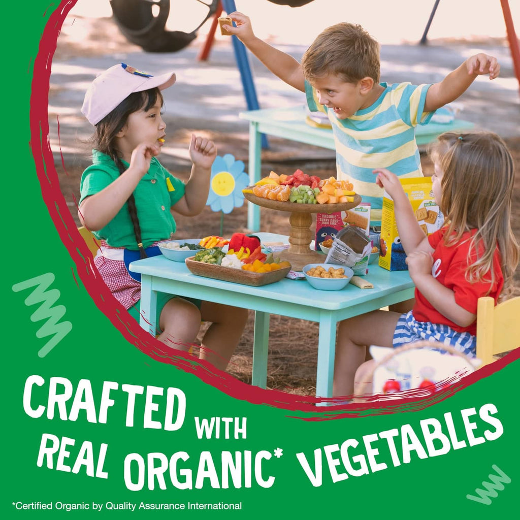 Children at a snack table with Organic Garden Veggie Straws on display