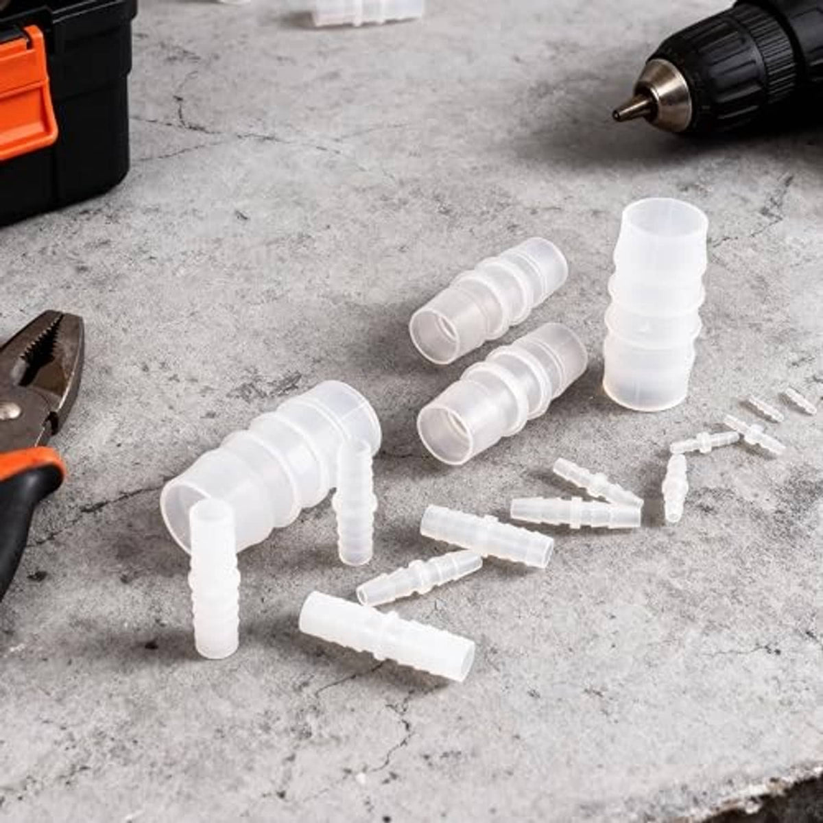 White plastic hose barbed splicer fittings and coupler joints with barbed connectors