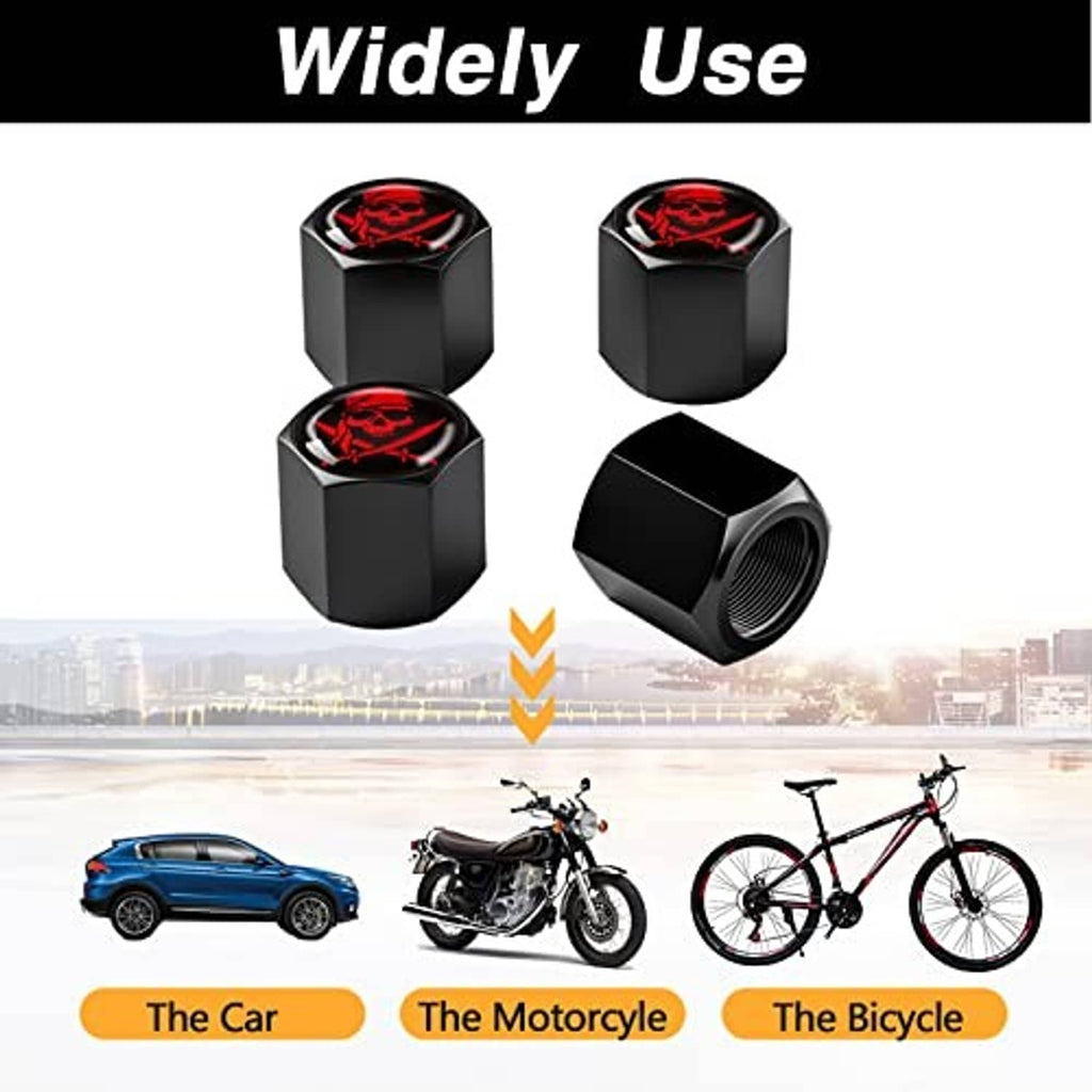 Four black tire valve stem caps with red skull tops for car, motorcycle, bicycle