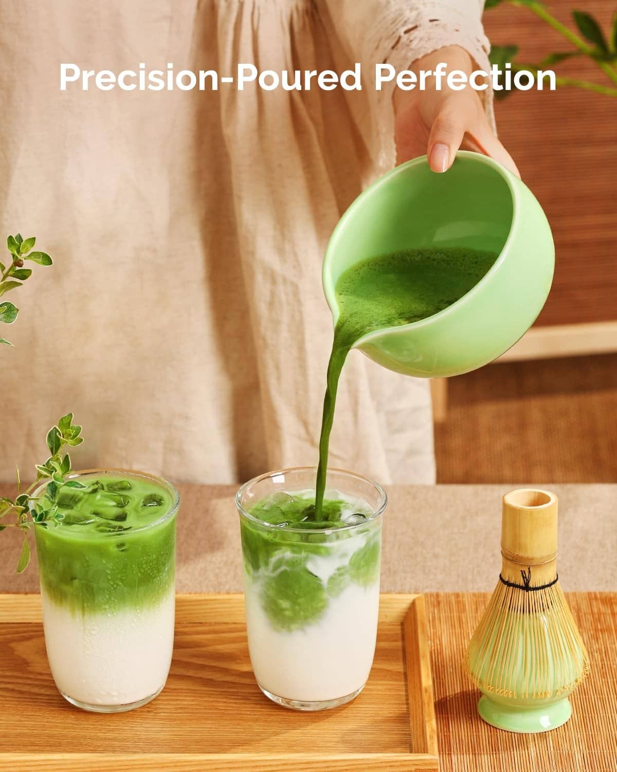 Green matcha pouring set with bowl and whisk brush, plus two glasses