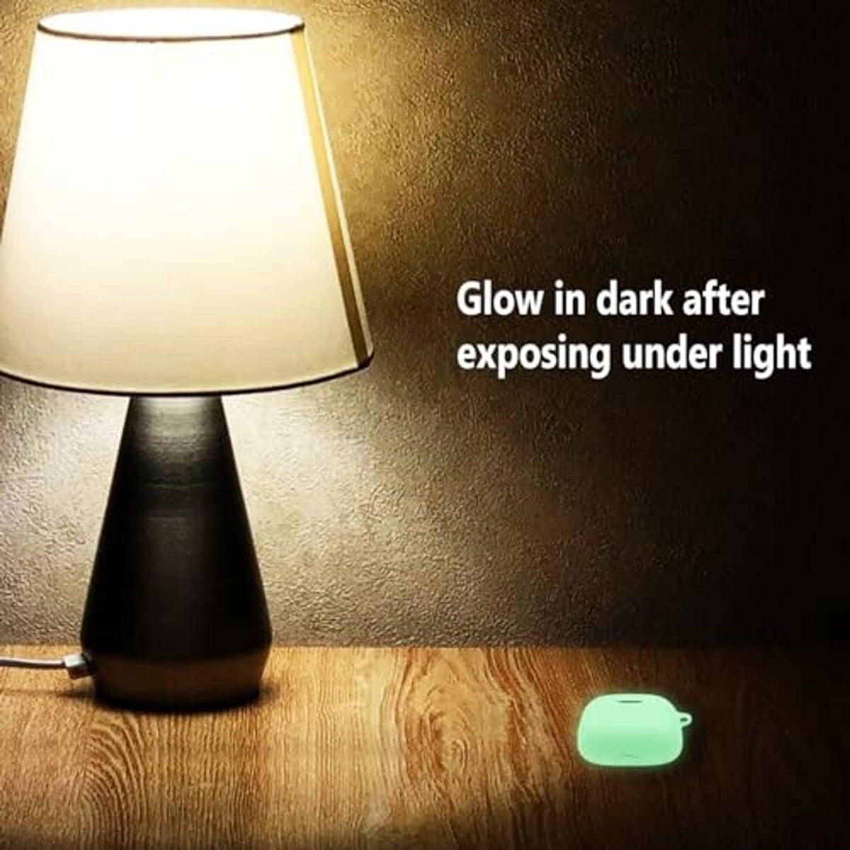 Small glowing green silicone earbud case, illuminated after light exposure