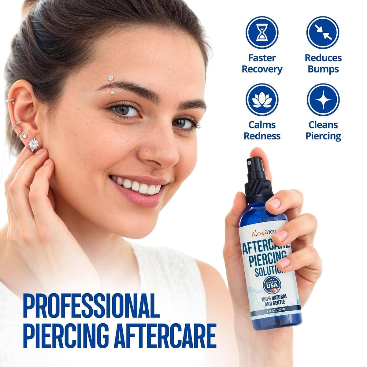 Piercing aftercare saline spray held by woman; ear piercing visible