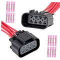 Headlight wiring harness connector pair with black housings and red lead wires