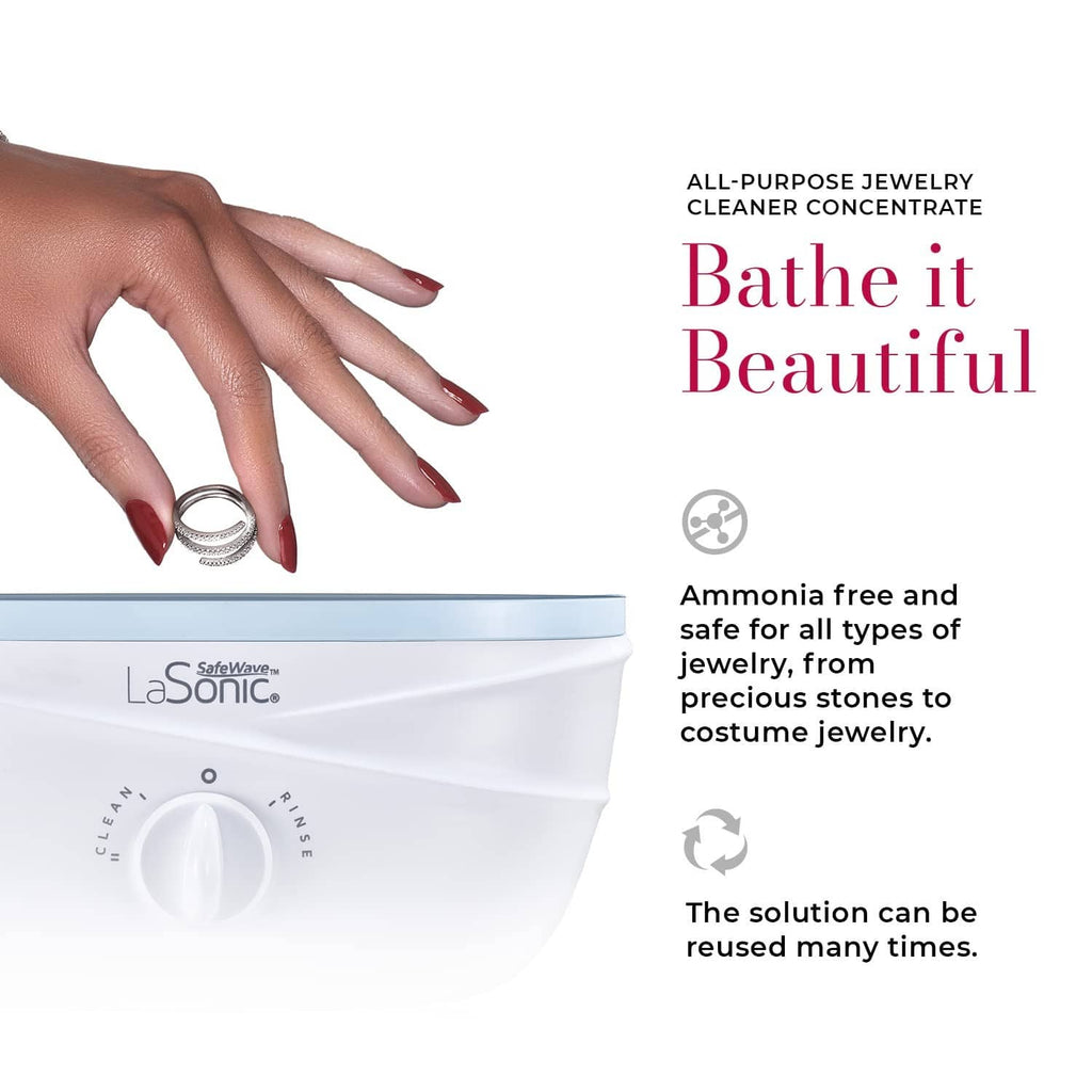 Jewelry cleaner concentrate used with a white cleaning bath container and ring