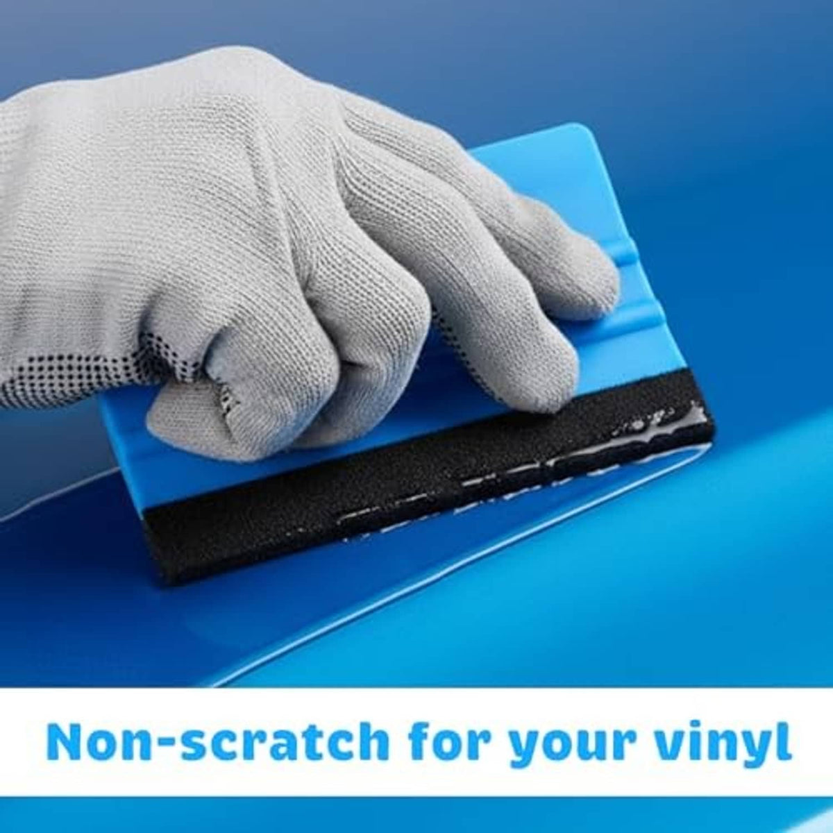 Close-up of a blue felt-edge squeegee pressed on a smooth surface
