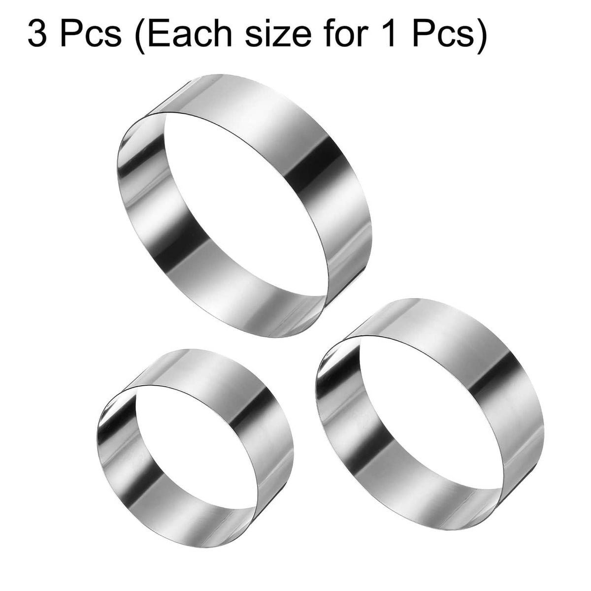 Three seamless stainless steel round cake rings with smooth inner walls