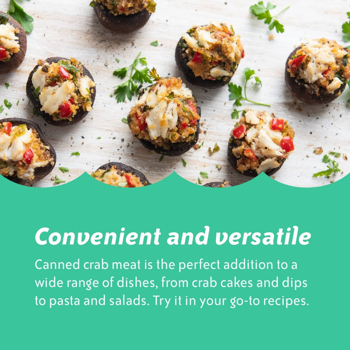 Bite-size crab meat cakes topped with herbs on a tray