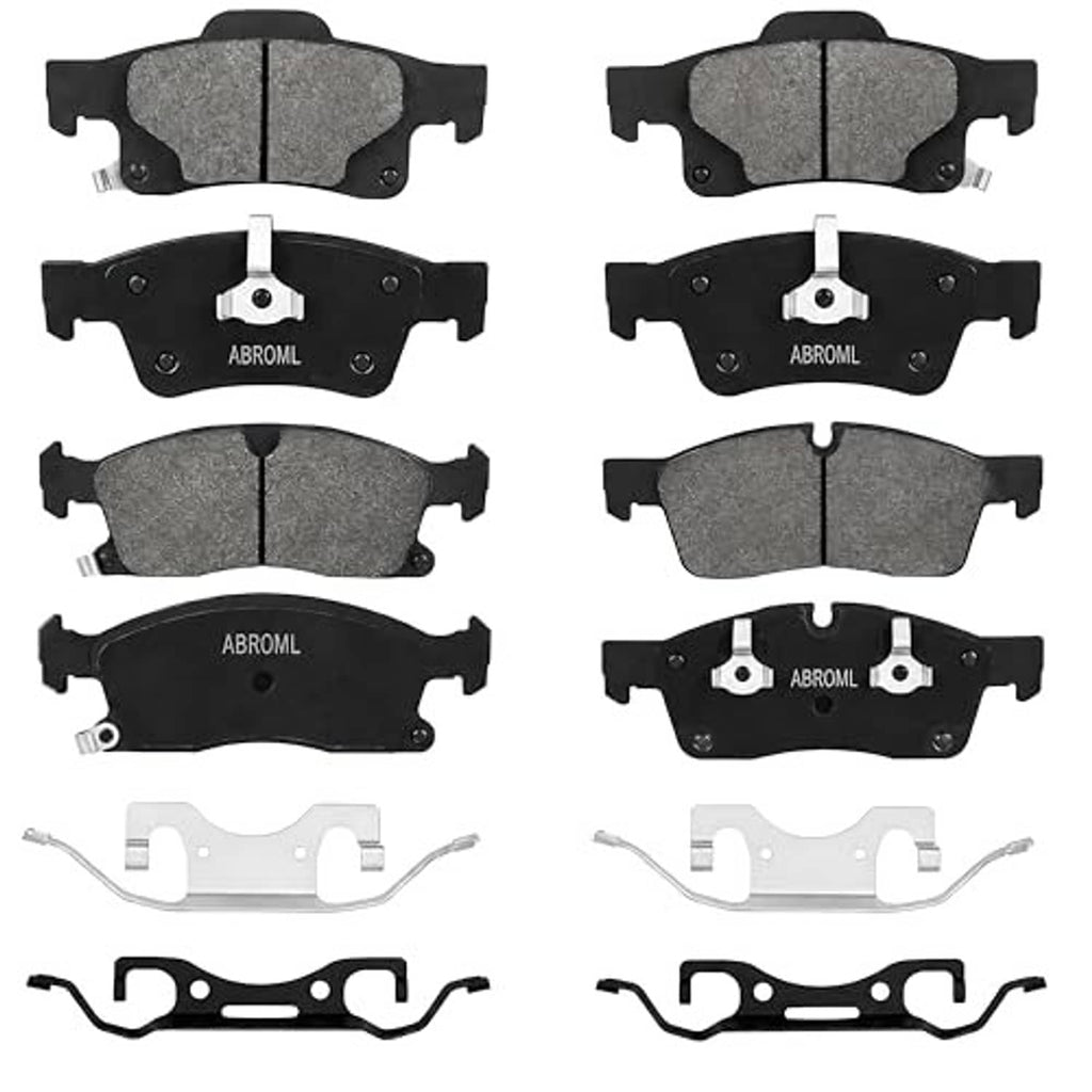 Brake pads set with grey friction and black backing, includes shims and hardware clips