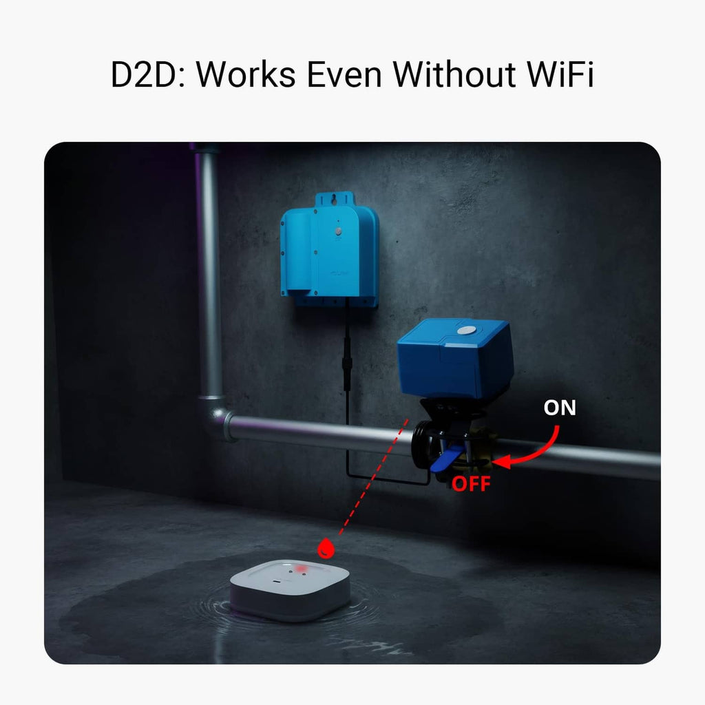 White water leak sensor near metal plumbing pipes with blue control module nearby.