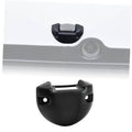 Black switch housing base cover mounted on a light gray panel edge