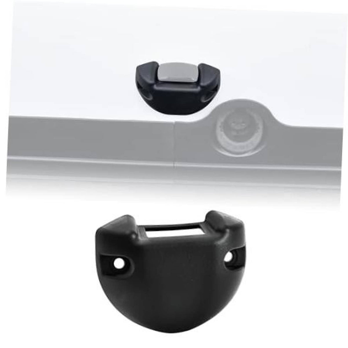 Black switch housing base cover mounted on a light gray panel edge
