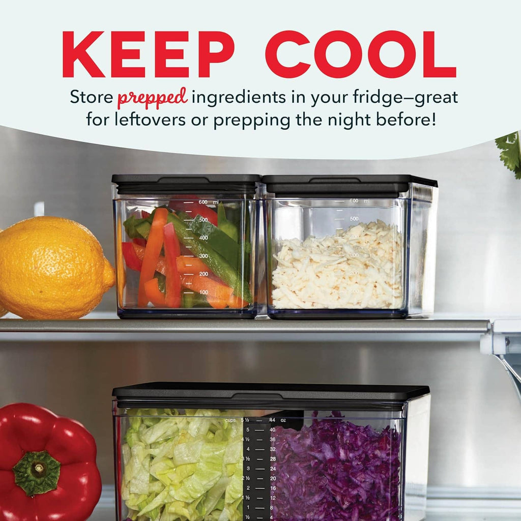 Clear and black storage containers on a shelf with chopped ingredients