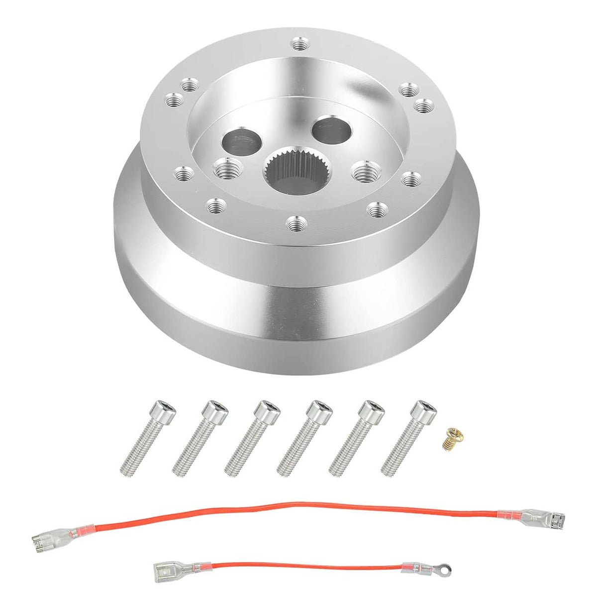 Silver steering wheel hub adapter with included installation bolts and wiring harness