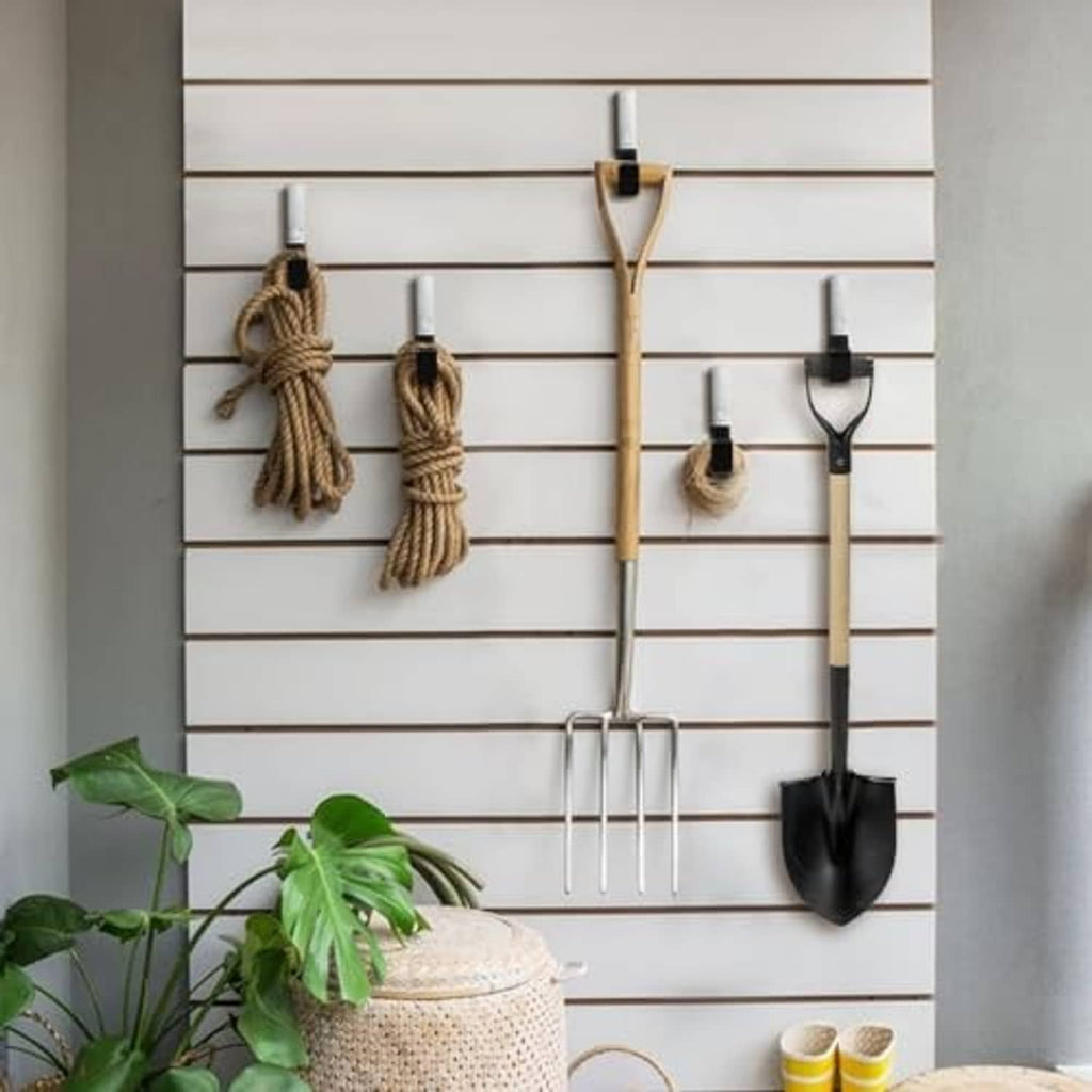 Steel garage hooks with black anti-slip PVC grips, mounted on a pegboard