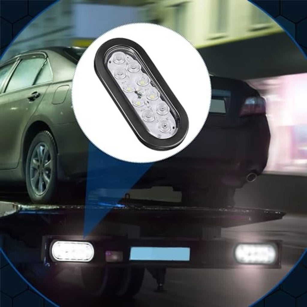 Oval LED trailer light with clear lens and white LEDs, black housing