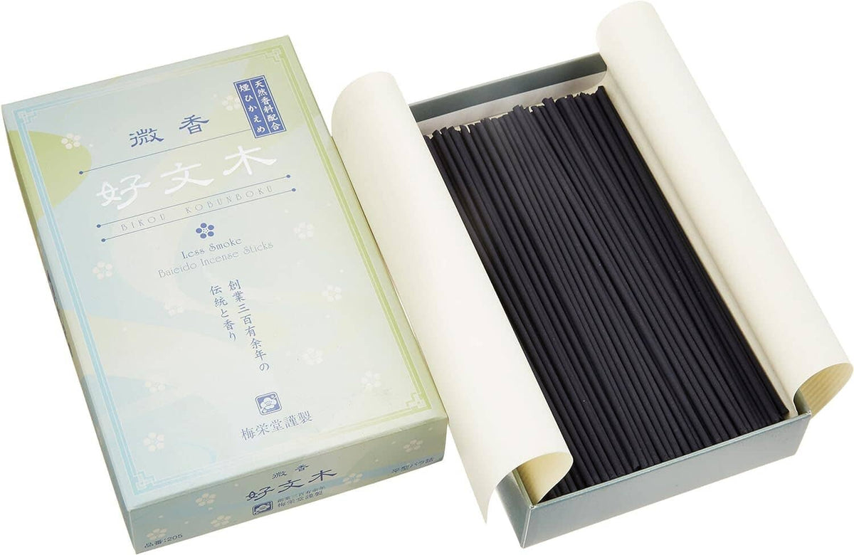 Japanese incense sticks set in box with black sticks and white wrapper