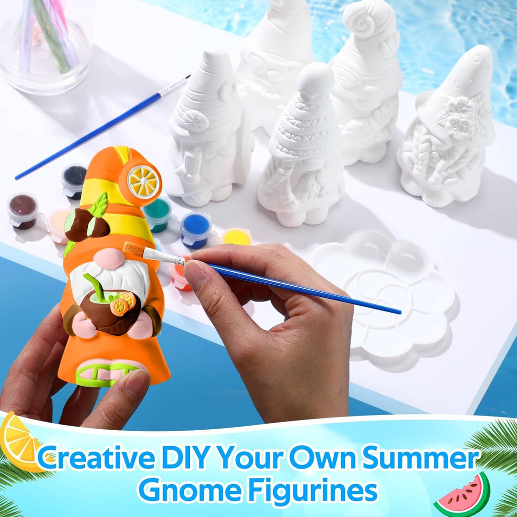 Hand painting a white ceramic gnome figurine with a blue paintbrush and paints