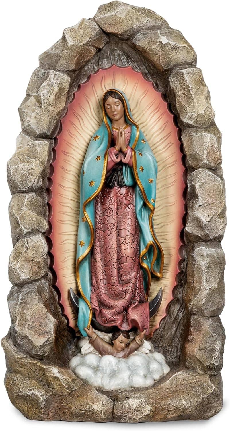 Virgin Mary statue in rocky frame, teal mantle with star details, pink inner halo.