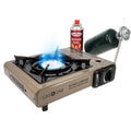 Portable dual-fuel propane and butane stove with blue flame on single burner, beige body