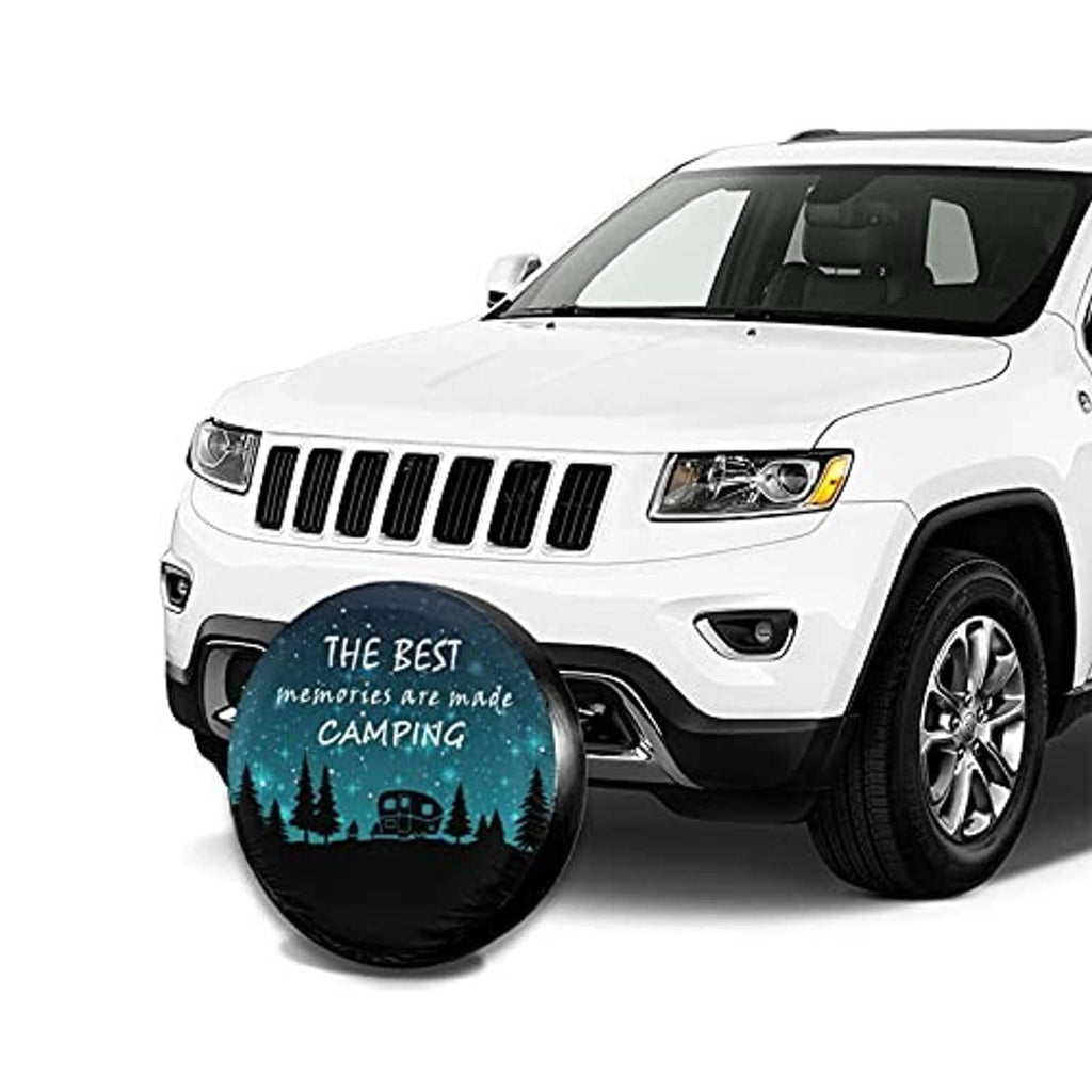 Spare tire cover with teal camping graphic mounted on the front of a white SUV