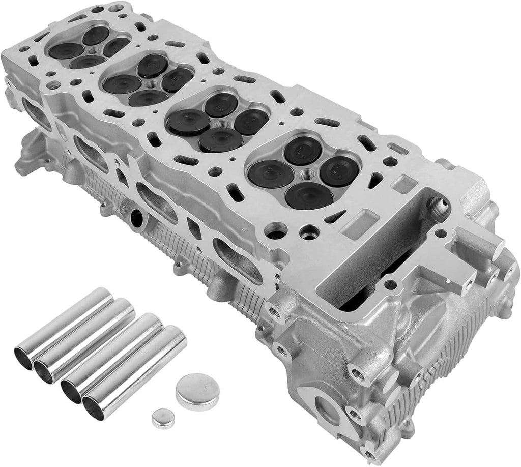 Cylinder head showing piston bore tops and valve cutouts, silver aluminum casting