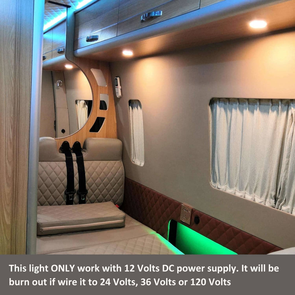 Recessed LED puck light installed in an RV ceiling
