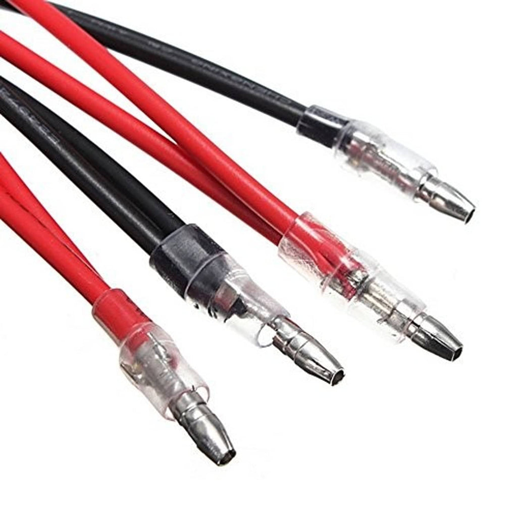 Inline resistor capsules with clear cylindrical housings on red and black wires