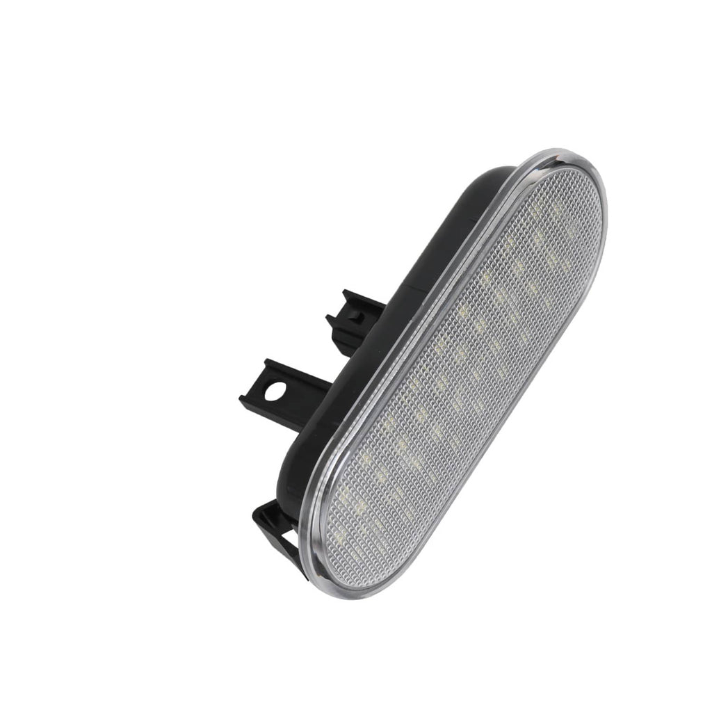 Oval LED bed light lens in black housing with side mounting clips