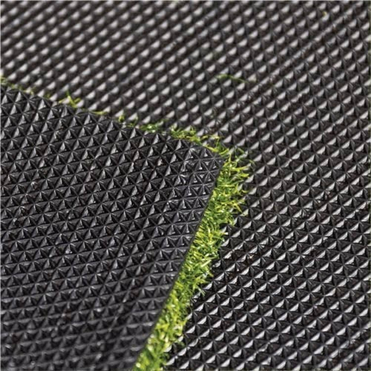 Close-up of textured side panel with green grass insert