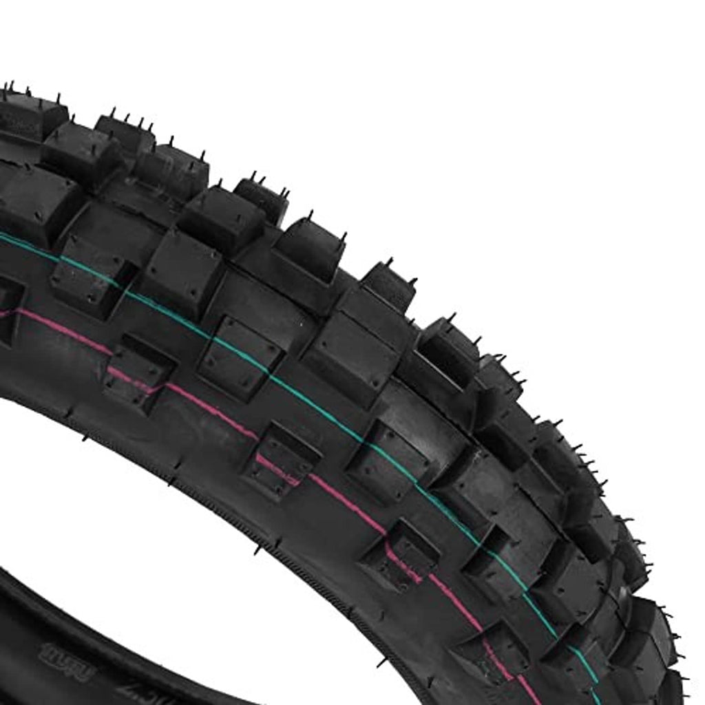 Off-road tire tread blocks with traction grooves along the tire surface
