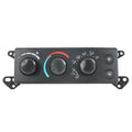 A/C heater climate control module with three black knobs and blue/red indicator arcs.