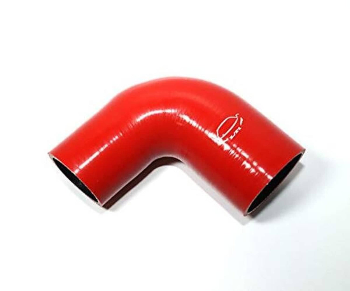 Red silicone 90-degree hose elbow, both black ends visible on the curve.