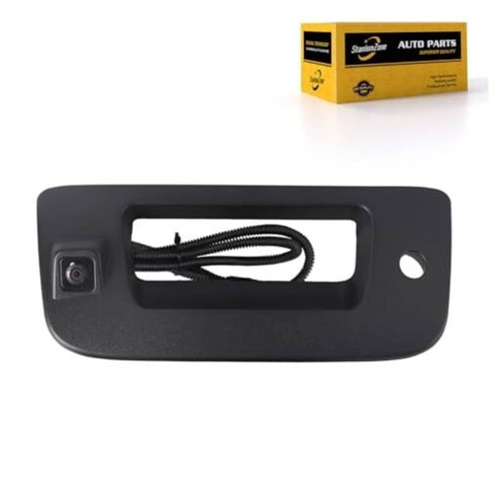 Black backup camera with attached cable and square lens opening in frame
