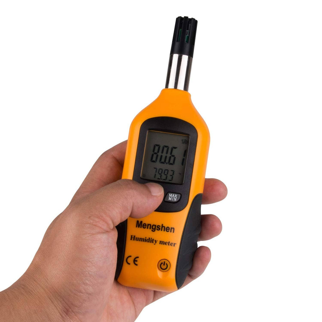 Orange handheld digital humidity and temperature meter with LCD display in hand
