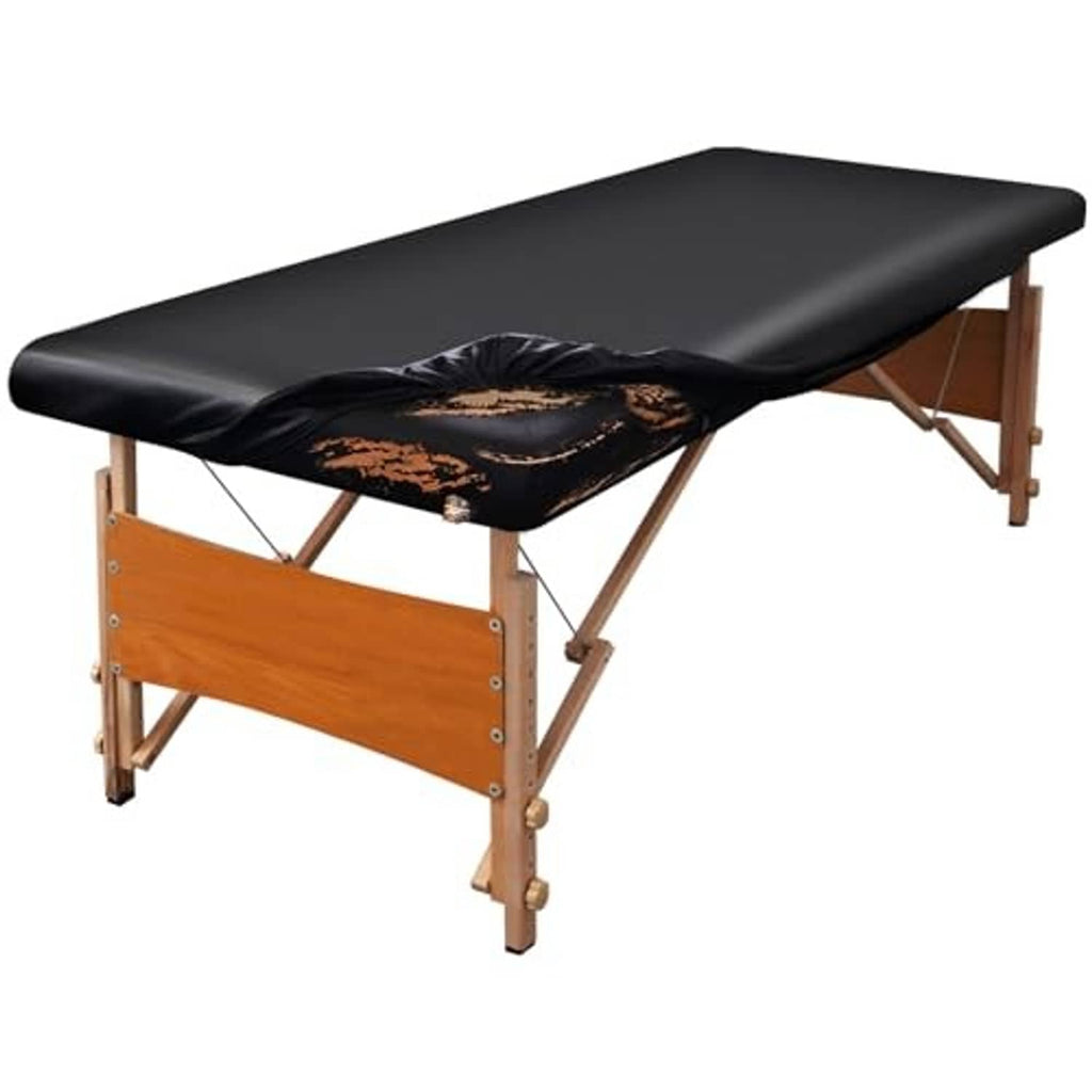 Black leather massage table cover protector with gold feather motif centered on the pad