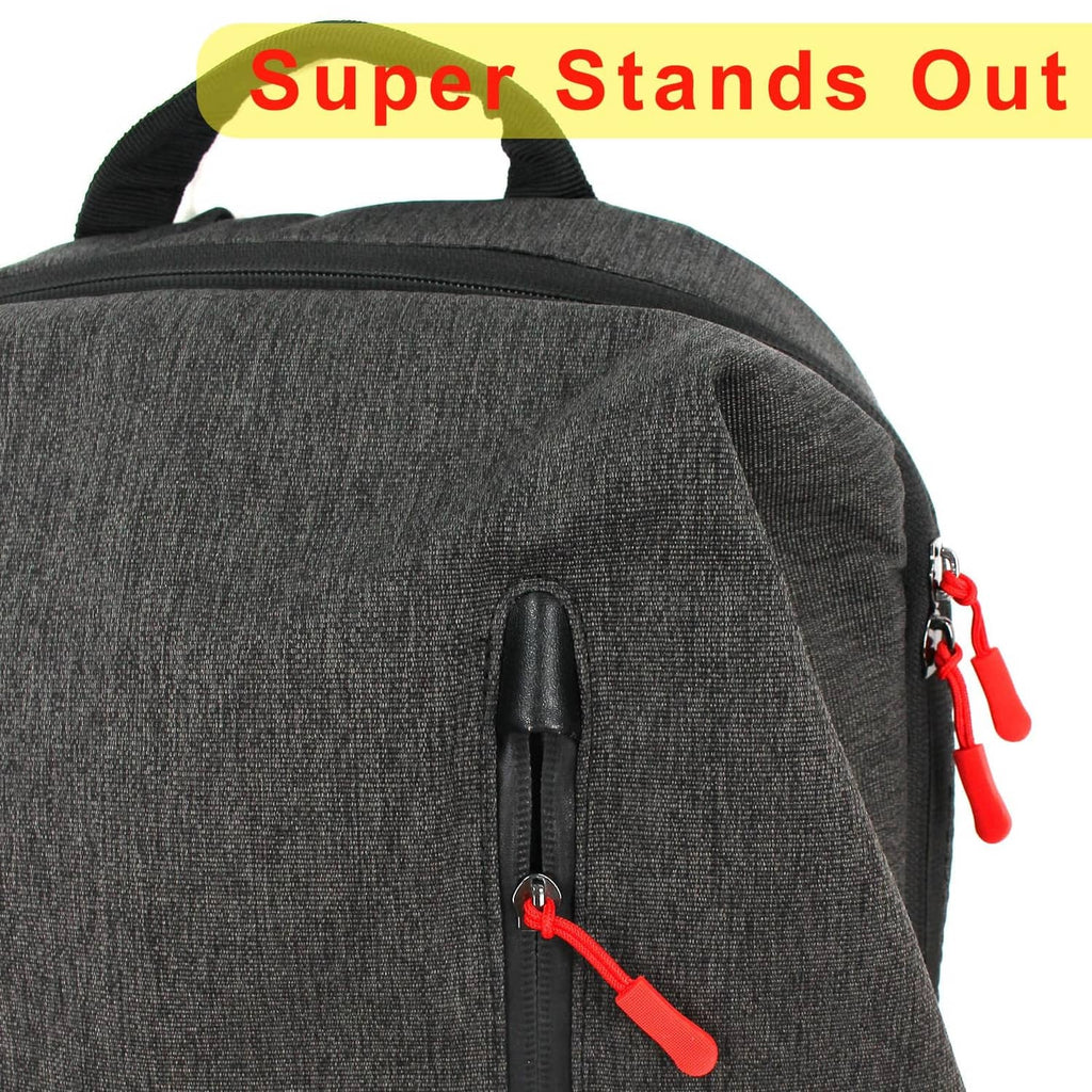 Red zipper pull tab with looped cord on a gray backpack zipper