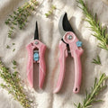 Pink pruning shears with bypass blades and safety lock, 2-pack