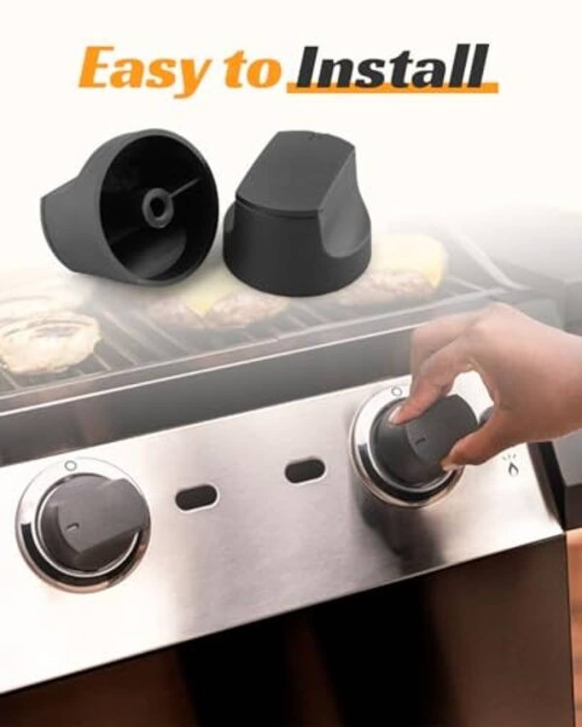 Matte black grill control knobs being installed by hand on control panel