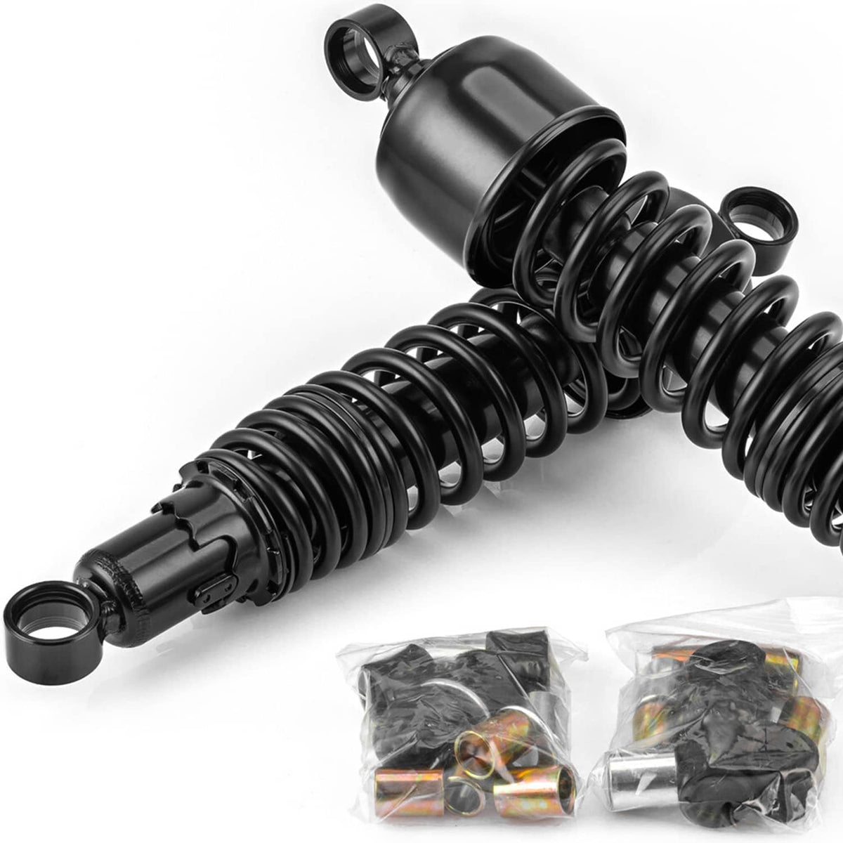Two black rear shocks with coil springs and included small hardware bags