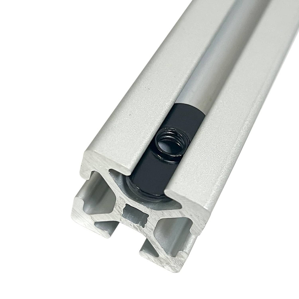 Black 1/4-20 T-nut seated in metal channel for centered sliding