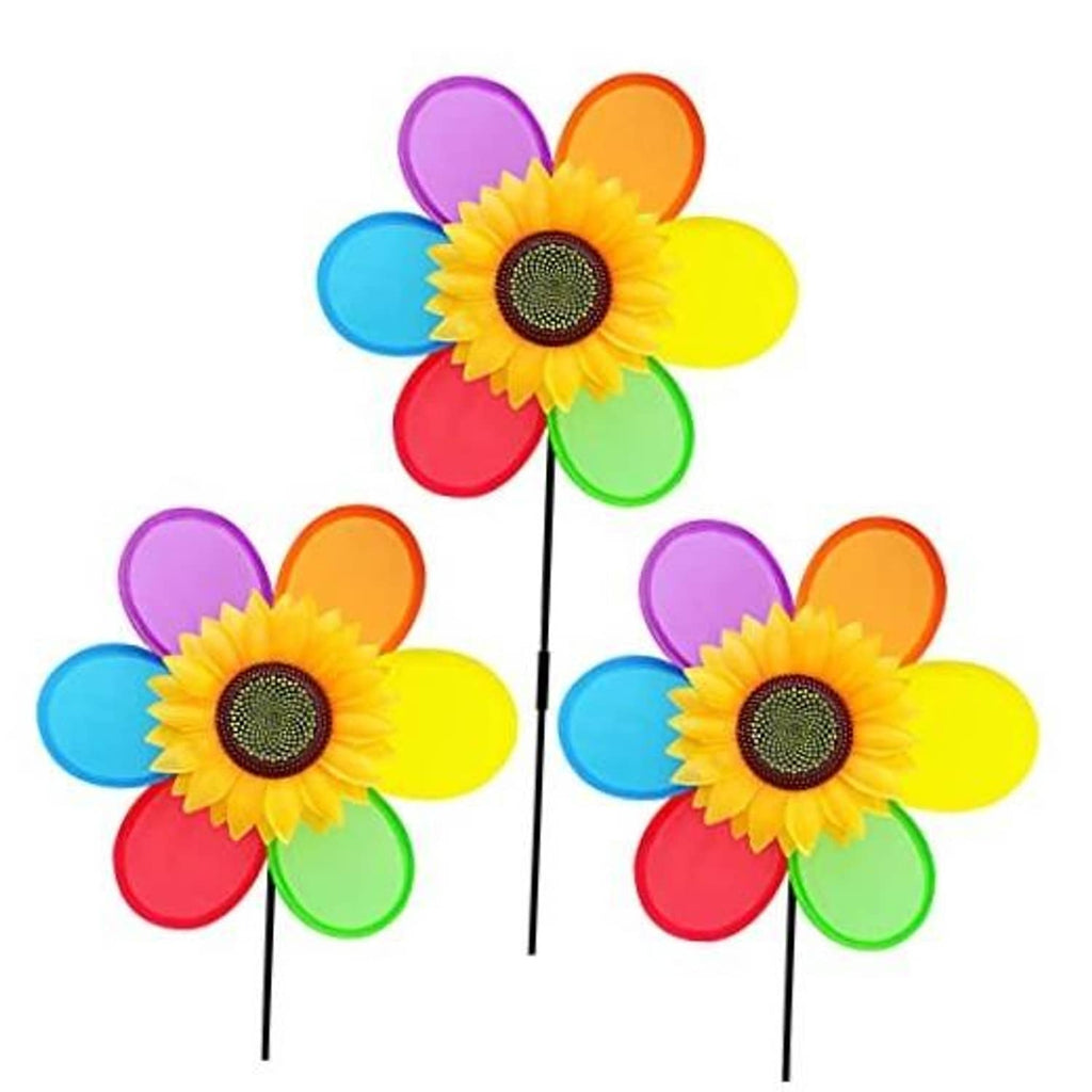 Colorful sunflower pinwheel yard windmill with black stakes, three pinwheels