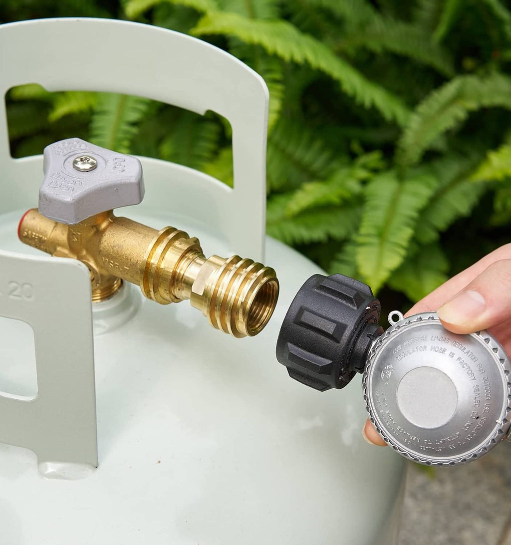 Brass adapter fitting onto propane cylinder valve with black regulator coupling
