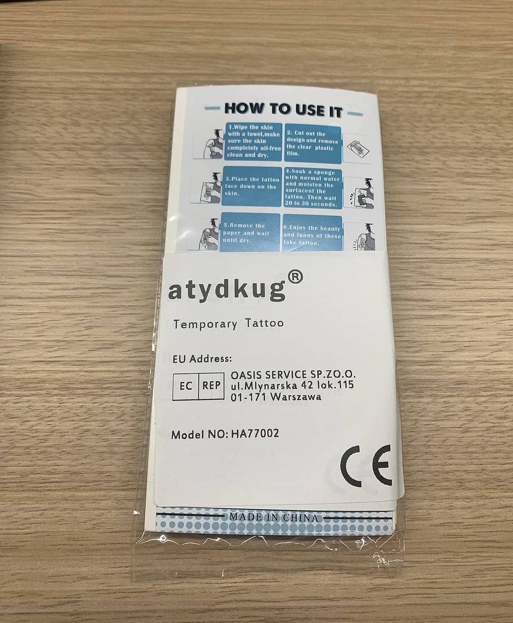 Temporary tattoo instruction packet with printed label and CE marking