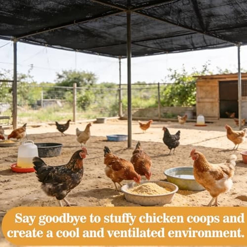 Black shade cloth canopy over an outdoor chicken run area