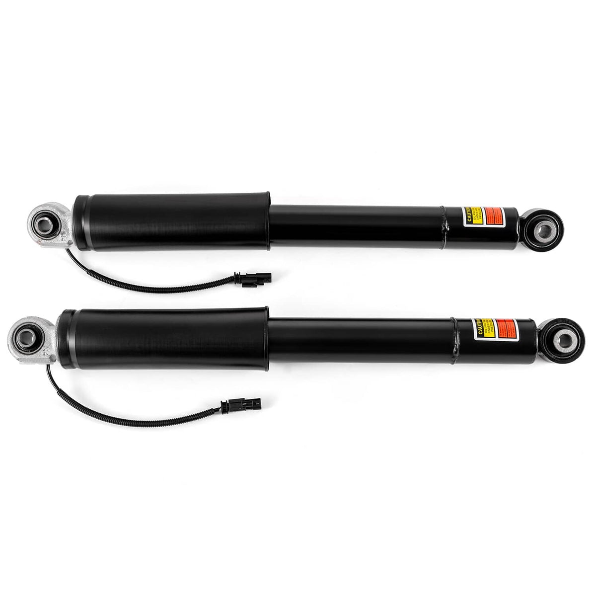 Black rear shock strut pair with bottom eye mounts and attached wiring harness