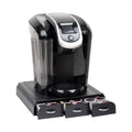 Black single-serve coffee pod organizer with three drawer compartments and hinged lid