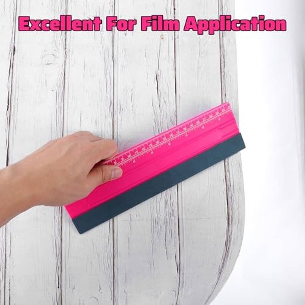 Pink vinyl squeegee with dark felt blade and printed measurement scale