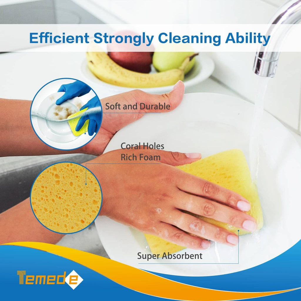 Yellow cellulose sponge with porous surface held over a sink for dish cleaning