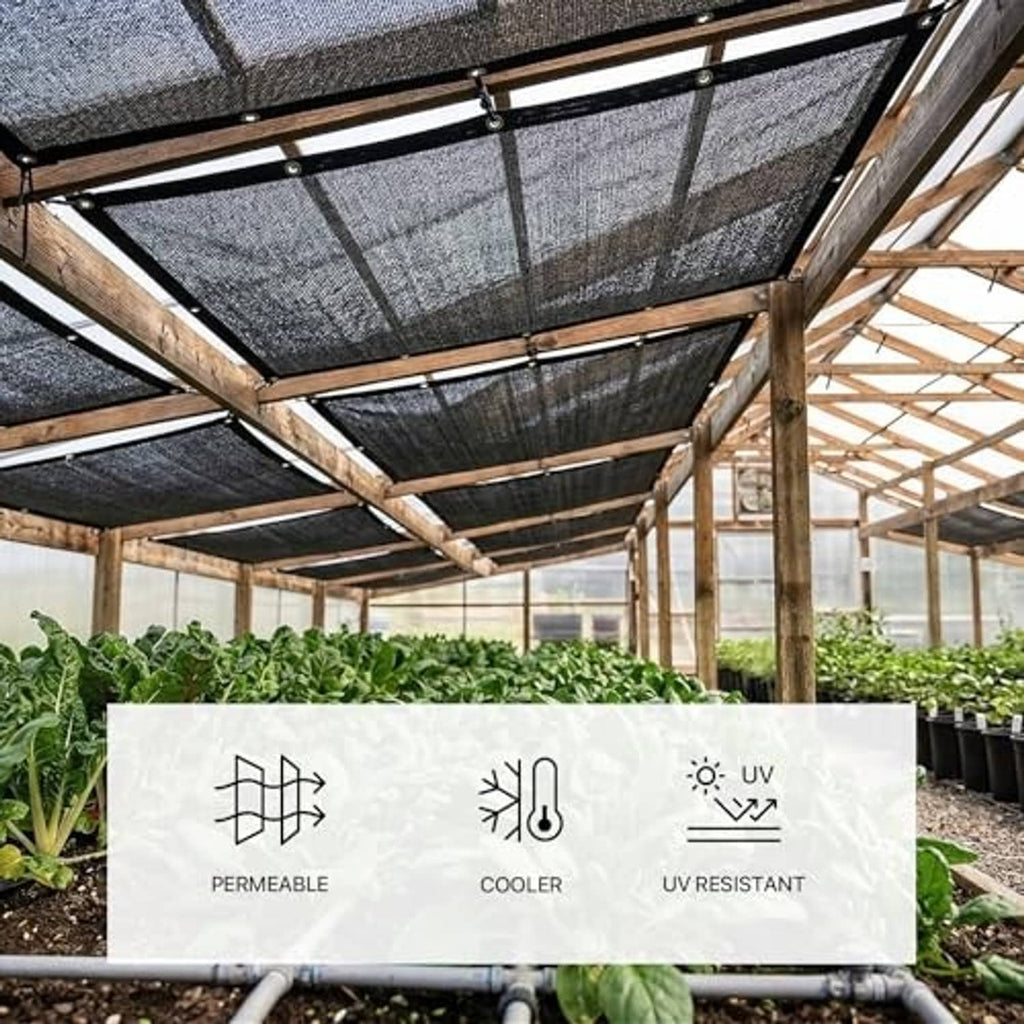 Dark shade cloth roof panel on a greenhouse frame for plants and crops