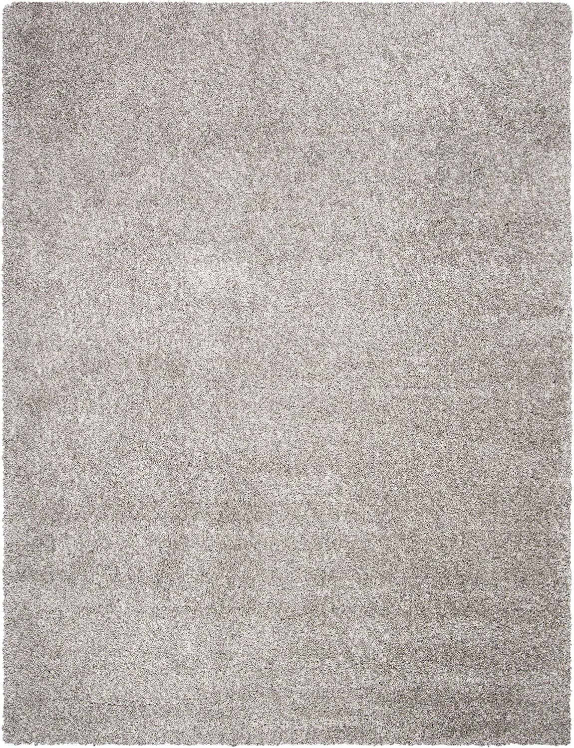 Silver shag area rug close view with dense short pile texture